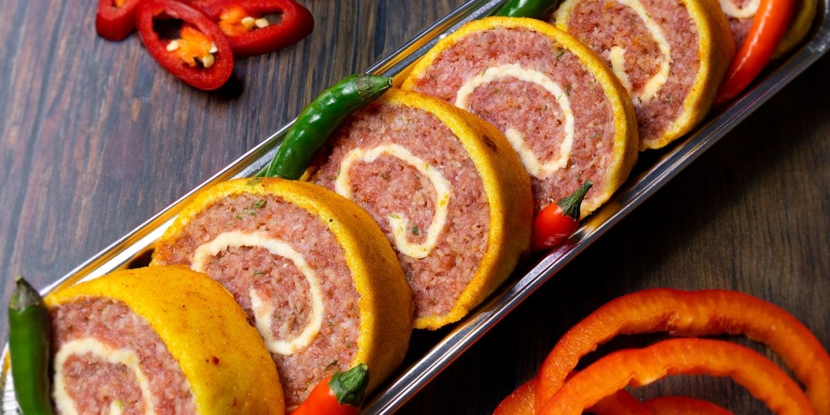 Turkey Roulade Tapas - Turkey Three Kings Sausage Mix wrapped in pastry and coated with Dalesman Maple & Chilli Glaze